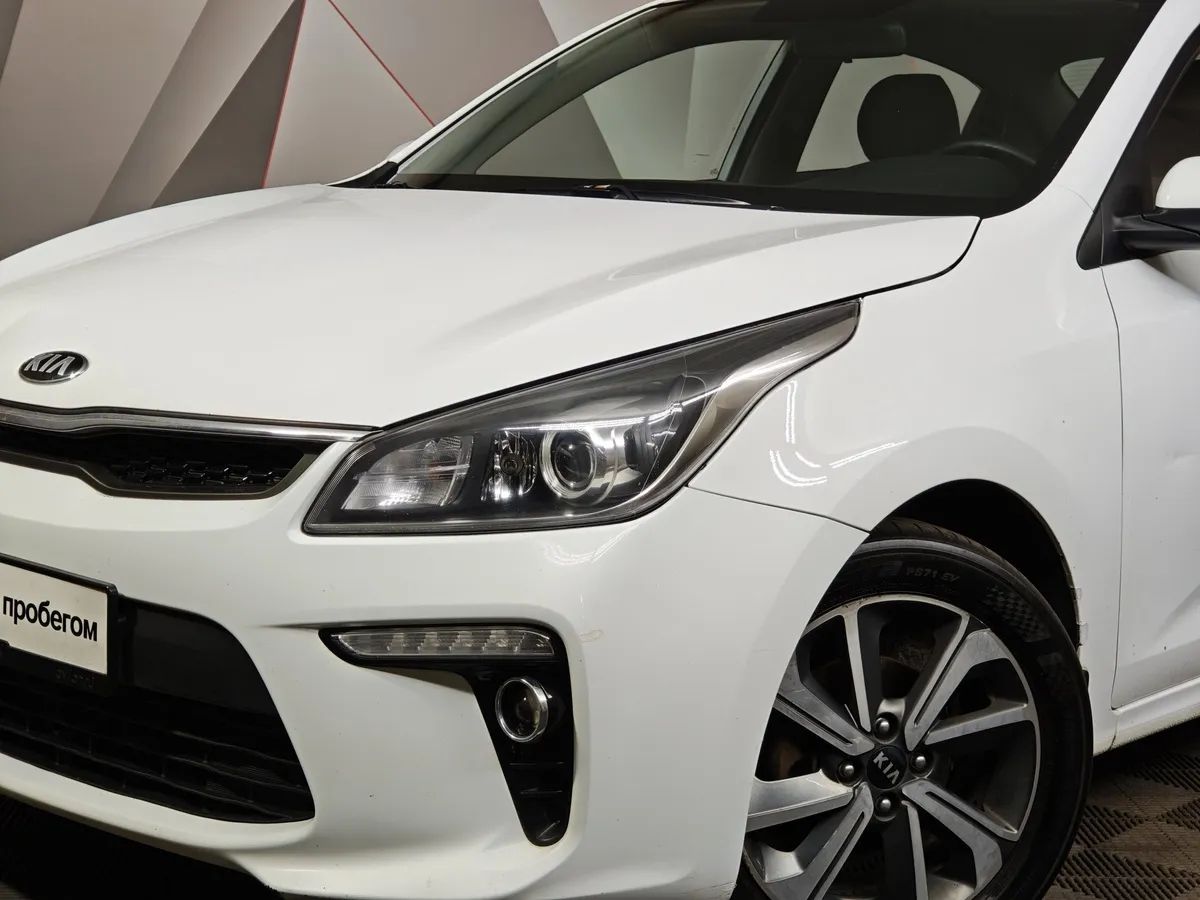 Kia Rio 1.6 AT (123 л.с.) Белый в АВИЛОН. Слайд №10