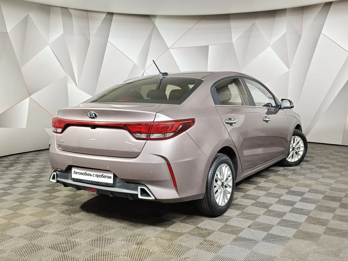 Kia Rio 1.6 AT (123 л.с.) Бежевый в АВИЛОН. Слайд №2