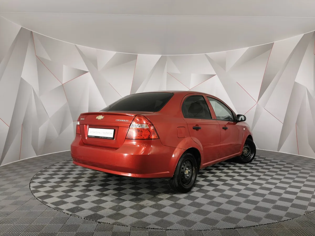 Chevrolet Aveo 1.4 MT (101 л.с.) Красный в АВИЛОН. Слайд №2