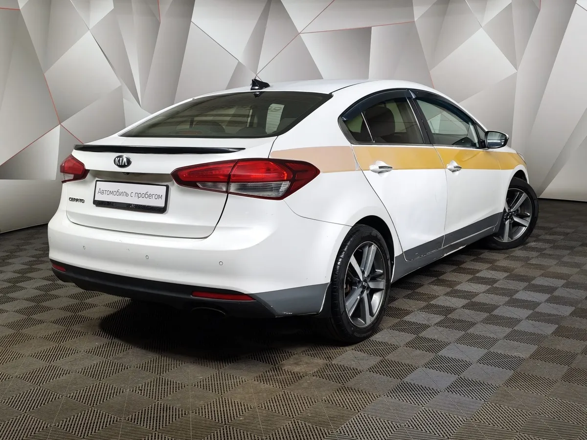 Kia Cerato 1.6 AT (130 л.с.) Comfort Белый в АВИЛОН. Слайд №2
