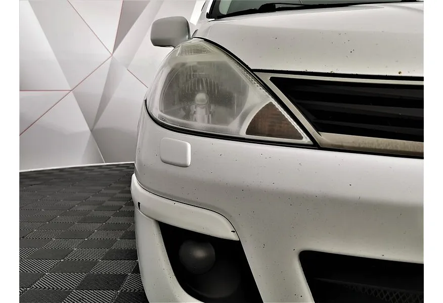 Nissan Tiida 1.6 AT (110 л.с.) Белый в АВИЛОН. Слайд №9