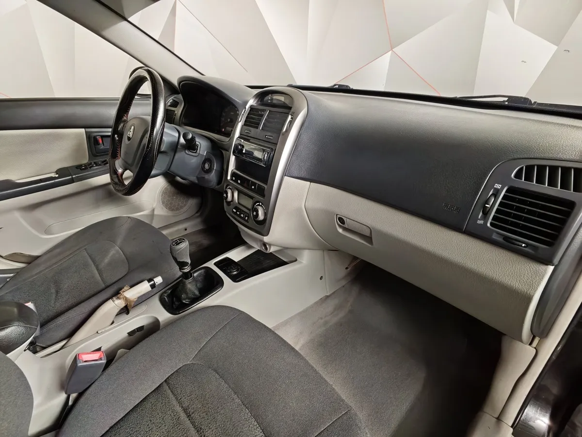 Kia Cerato 1.6 MT (105 л.с.) Черный в АВИЛОН. Слайд №10