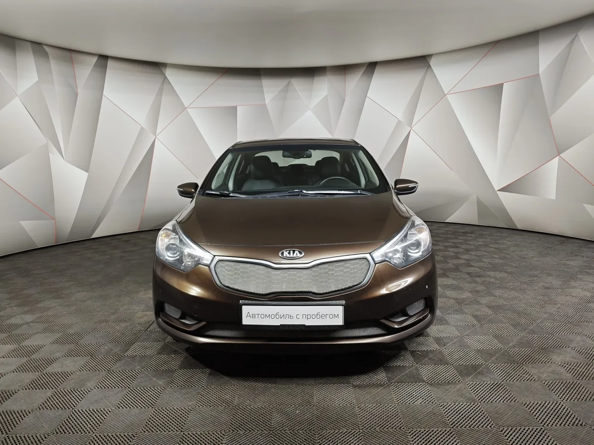 Kia Cerato 1.6 AT (130 л.с.) Коричневый в АВИЛОН. Слайд №7