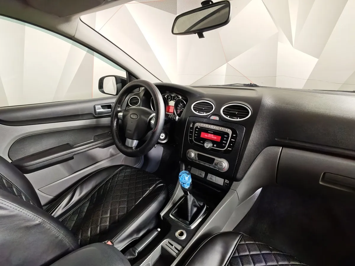 Ford Focus 1.8 MT (125 л.с.) Ghia Черный в АВИЛОН. Слайд №13