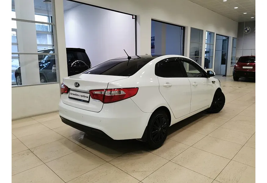 Kia Rio 1.6 AT (123 л.с.) Белый в АВИЛОН. Слайд №2