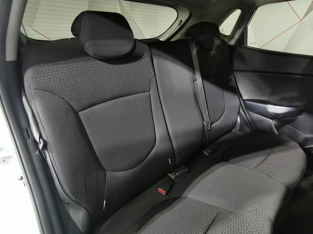 Kia Rio 1.6 MT (123 л.с.) Comfort Белый в АВИЛОН. Слайд №16