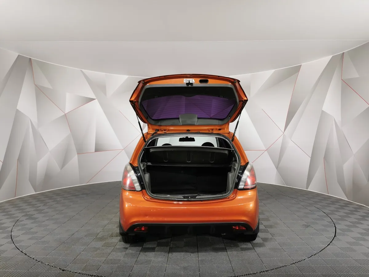 Kia Rio 1.4 MT (97 л.с.) Оранжевый в АВИЛОН. Слайд №11