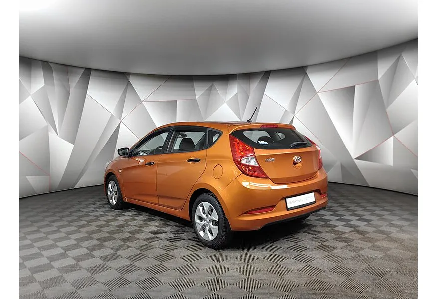 Hyundai Solaris 1.6 MT (123 л.с.) Comfort Оранжевый в АВИЛОН. Слайд №4 Hyundai Solaris 1.6 MT (123 л.с.) Comfort Оранжевый в АВИЛОН. Слайд №4