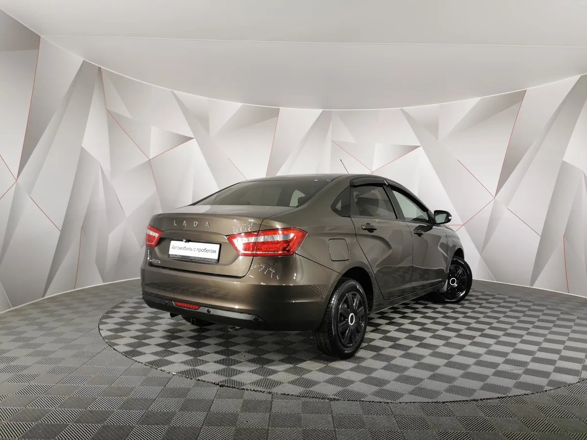 ВАЗ (Lada) Vesta 1.6 CVT (113 л.с.) Luxe Multimedia Коричневый в АВИЛОН. Слайд №2