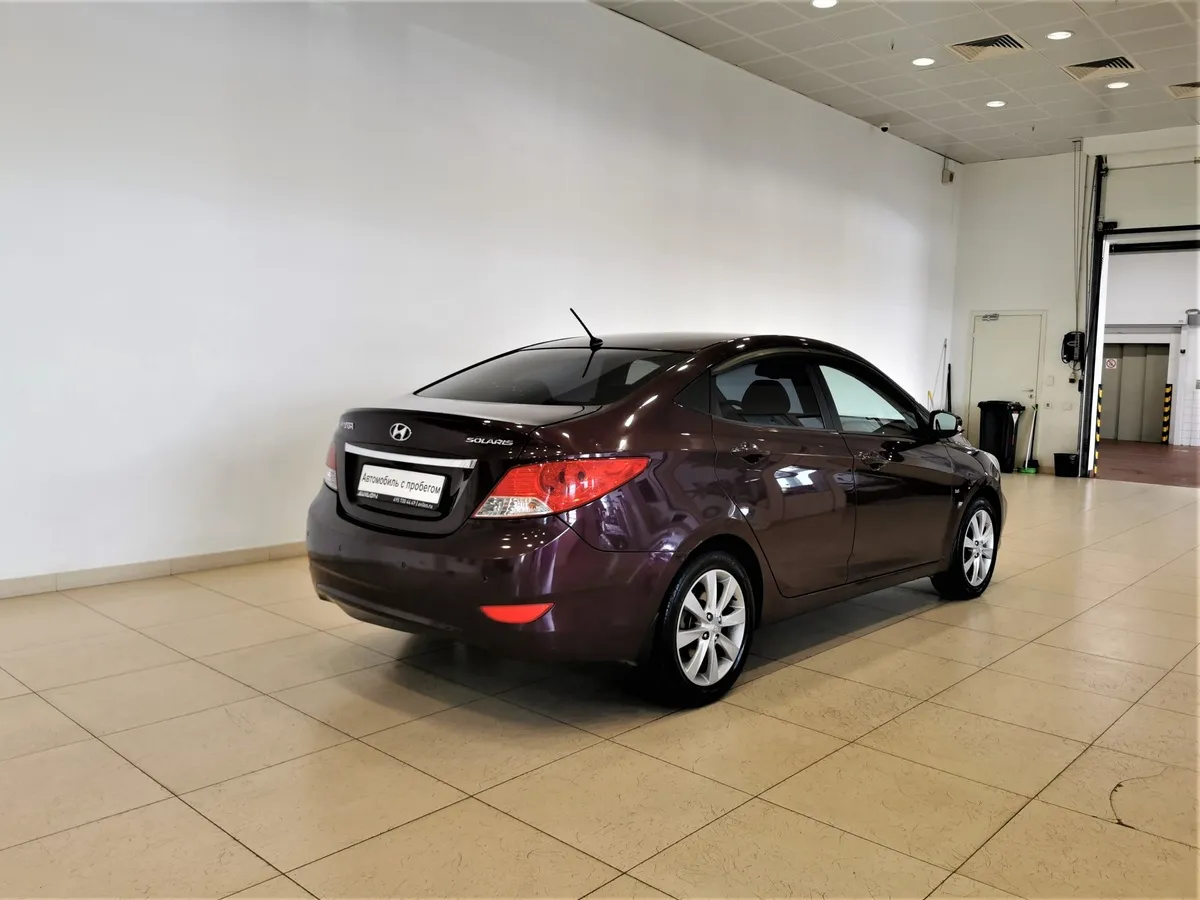 Hyundai Solaris 1.6 AT (123 л.с.) Elegance + Prestige + Safety Фиолетовый в АВИЛОН. Слайд №2