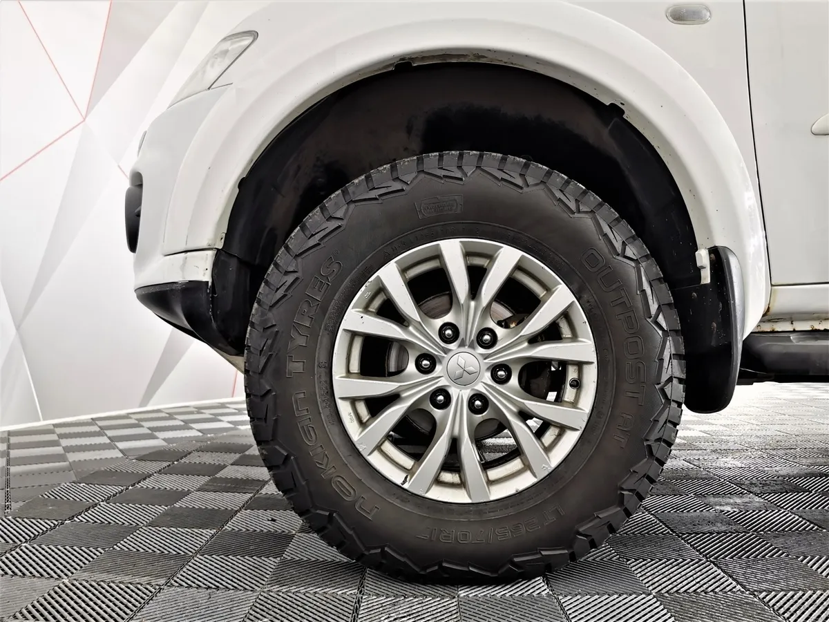 Mitsubishi Pajero Sport 2.5 DI-D AT AWD (178 л.с.) Белый в АВИЛОН. Слайд №9