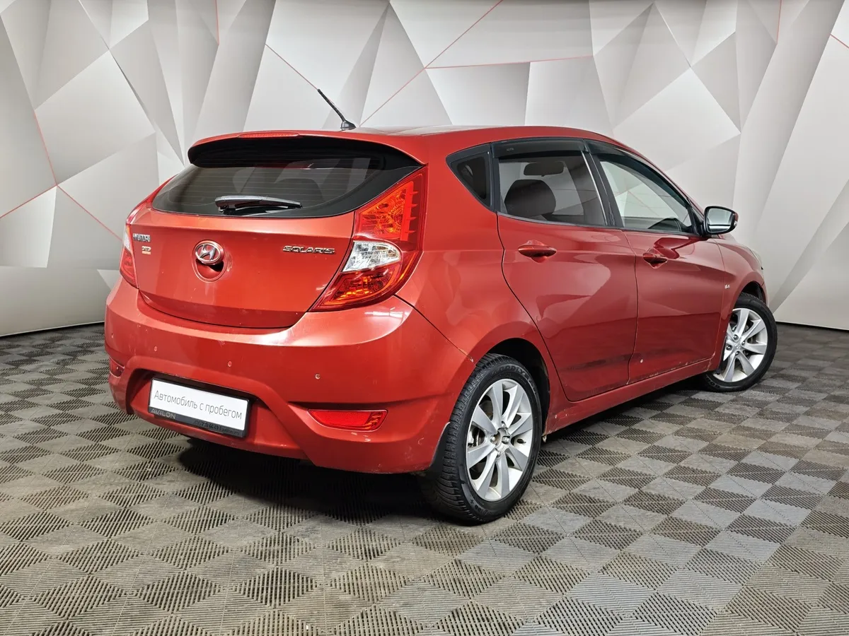 Hyundai Solaris 1.6 AT (123 л.с.) Comfort Красный в АВИЛОН. Слайд №2