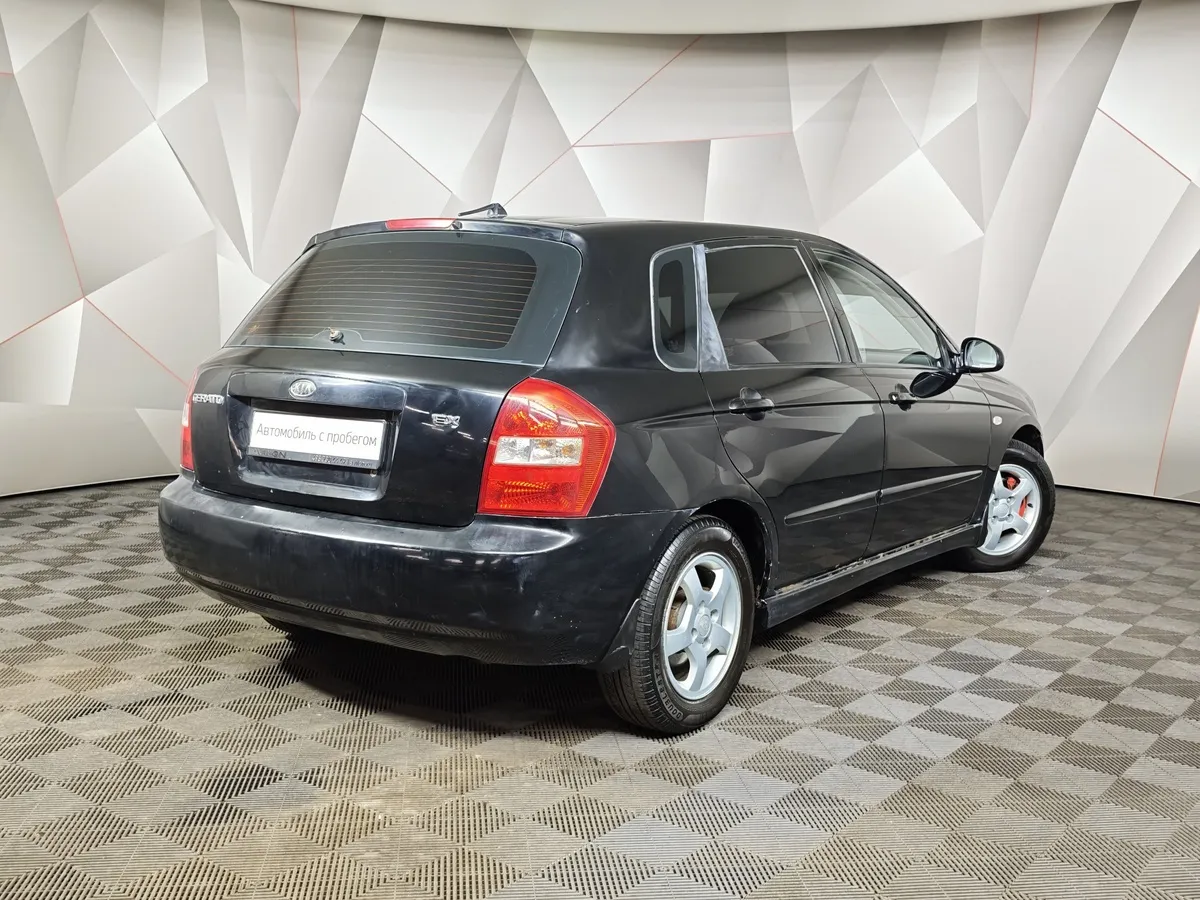 Kia Cerato 1.6 MT (105 л.с.) Черный в АВИЛОН. Слайд №2