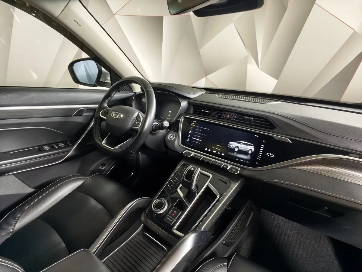 Geely Atlas Pro 1.5T 7DCT AWD (177 л.с.) Flagship Серый в АВИЛОН. Слайд №13