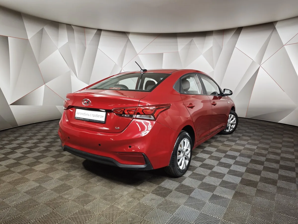 Hyundai Solaris 1.6 AT (123 л.с.) Active Plus Красный в АВИЛОН. Слайд №2