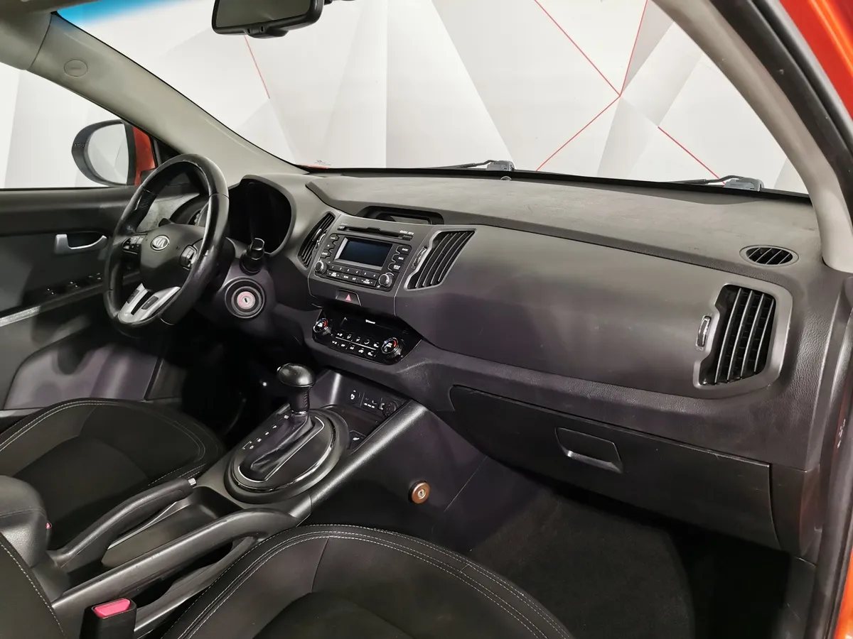 Kia Sportage 2.0 AT 4WD (150 л.с.) Luxe Оранжевый в АВИЛОН. Слайд №12