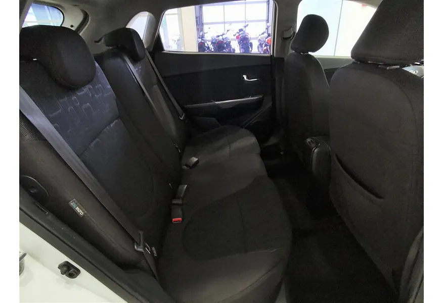 Kia Rio 1.6 AT (123 л.с.) Белый в АВИЛОН. Слайд №15