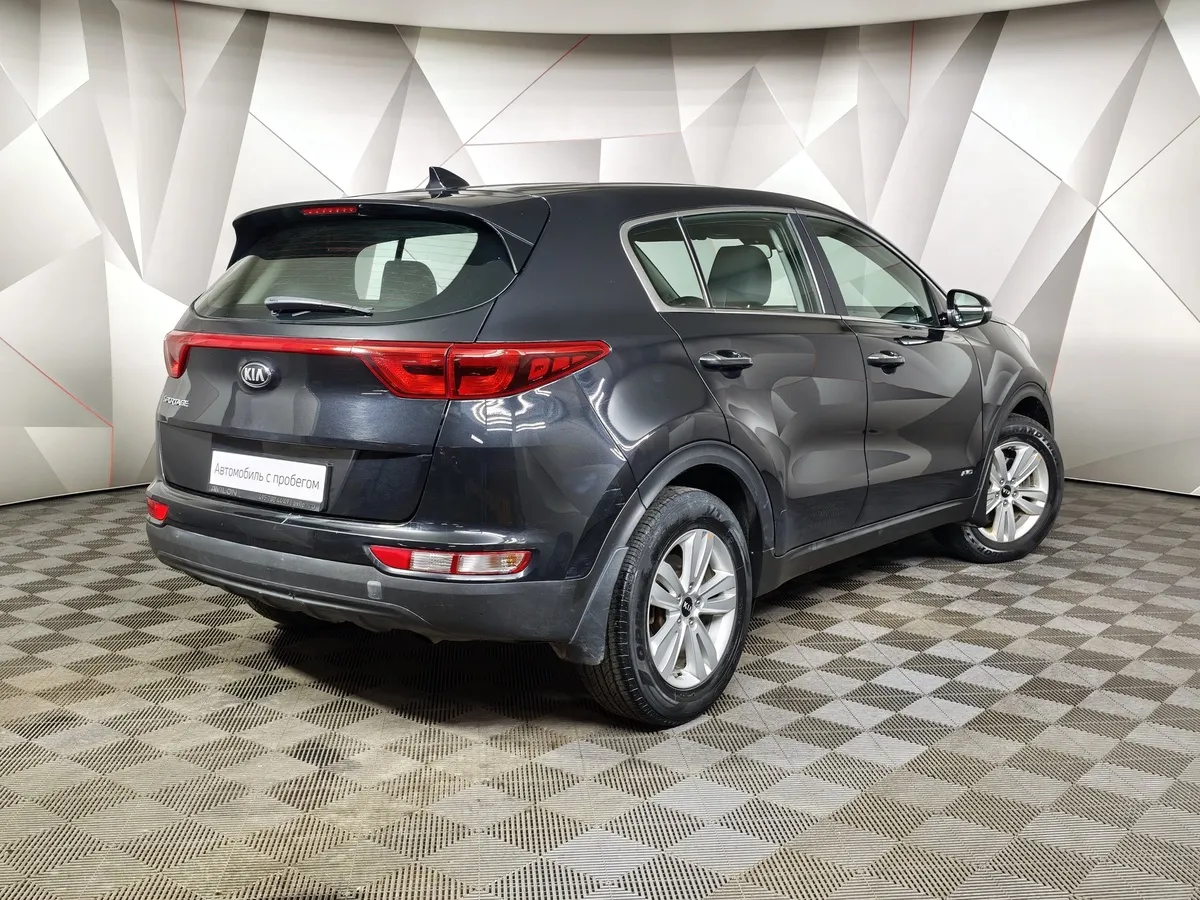 Kia Sportage 2.0 AT 4WD (150 л.с.) Comfort Черный в АВИЛОН. Слайд №2