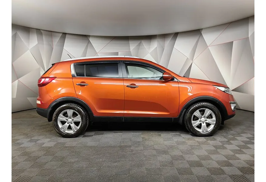 Kia Sportage 2.0 AT 4WD (142 л.с.) Оранжевый в АВИЛОН. Слайд №6