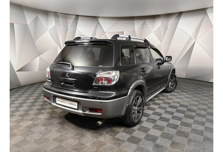 Mitsubishi Outlander 2.4 AT 4WD (160 л.с.) Черный в АВИЛОН. Слайд №2