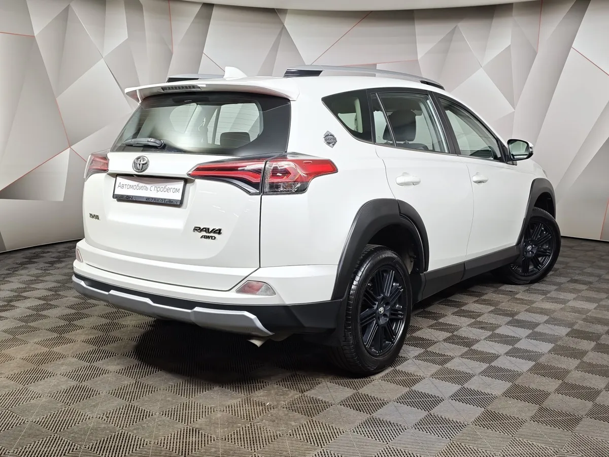 Toyota RAV4 2.5 AT 4WD (180 л.с.) Престиж Белый в АВИЛОН. Слайд №2