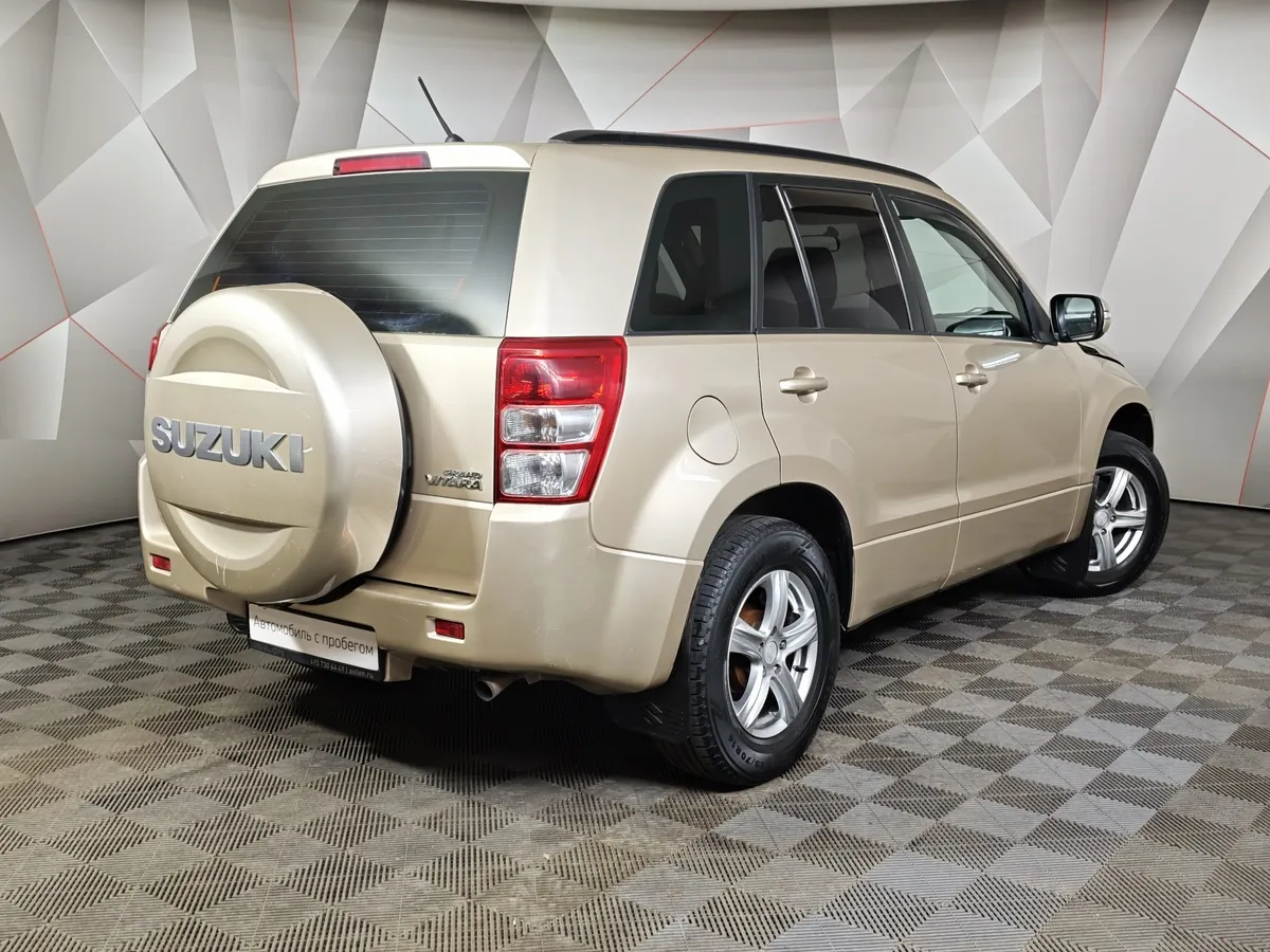 Suzuki Grand Vitara 2.0 AT AWD (140 л.с.) Бежевый в АВИЛОН. Слайд №2