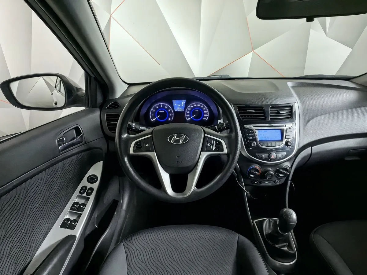 Hyundai Solaris 1.6 MT (123 л.с.) Classic + AC Серебристый в АВИЛОН. Слайд №19