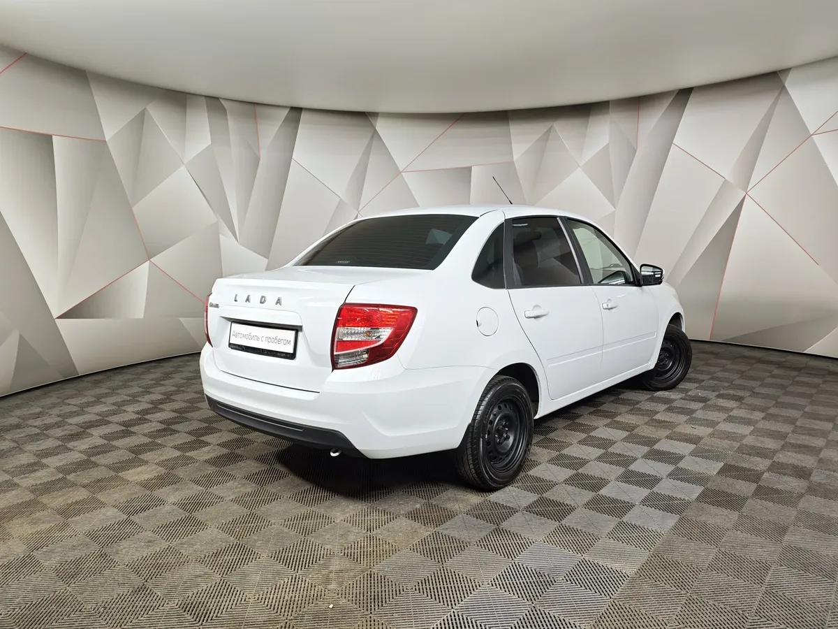 ВАЗ (Lada) Granta 1.6 MT 8кл (87 л.с.) Белый в АВИЛОН. Слайд №2