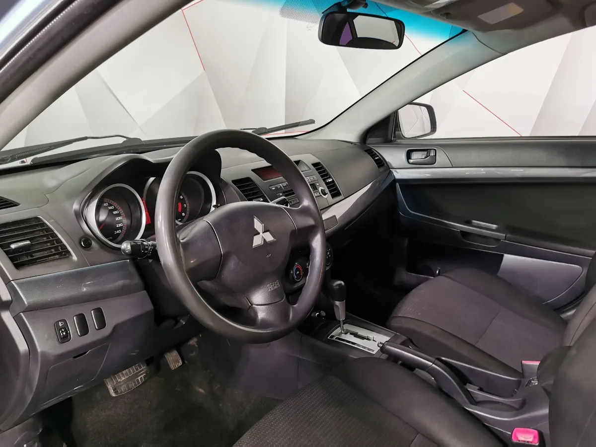 Mitsubishi Lancer 1.6 AT (117 л.с.) Зеленый в АВИЛОН. Слайд №19