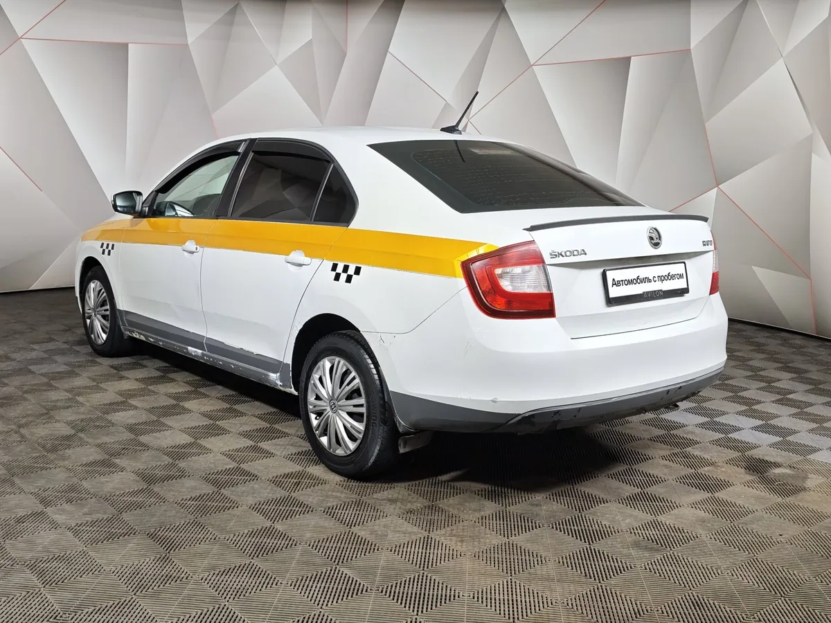 Skoda Rapid 1.6 AT (110 л.с.) Белый в АВИЛОН. Слайд №4