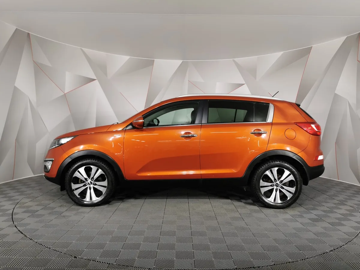 Kia Sportage 2.0 AT 4WD (150 л.с.) Luxe Оранжевый в АВИЛОН. Слайд №5