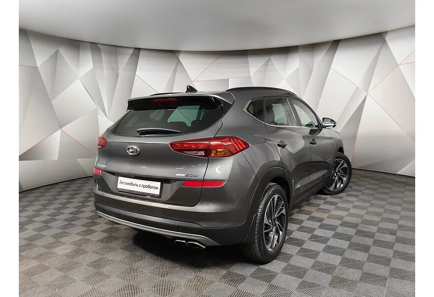 Hyundai Tucson 2.0 CRDi AT 4WD (185 л.с.) High-Tech Коричневый в АВИЛОН. Слайд №2