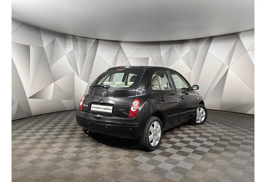 Nissan Micra 1.4 AT (88 л.с.) Черный в АВИЛОН. Слайд №2