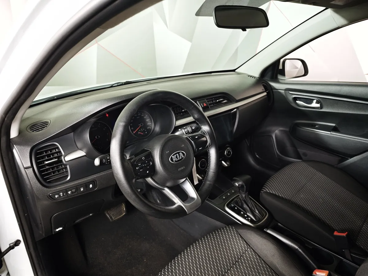 Kia Rio 1.6 AT (123 л.с.) Белый в АВИЛОН. Слайд №19