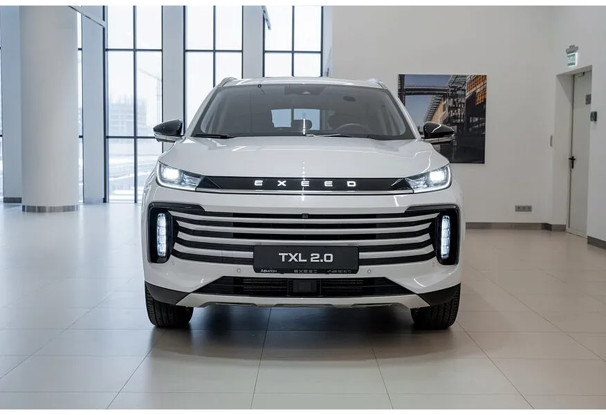 EXEED TXL 2.0 8AT AWD (197 л.с.) Flagship IOV Белый в АВИЛОН. Слайд №4