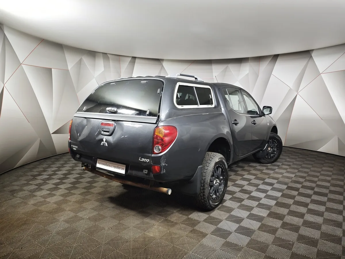 Mitsubishi L200 2.5 DI-D MT 4WD (136 л.с.) Серый в АВИЛОН. Слайд №2