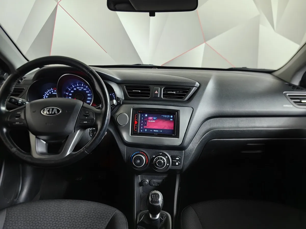 Kia Rio 1.6 MT (123 л.с.) Белый в АВИЛОН. Слайд №15