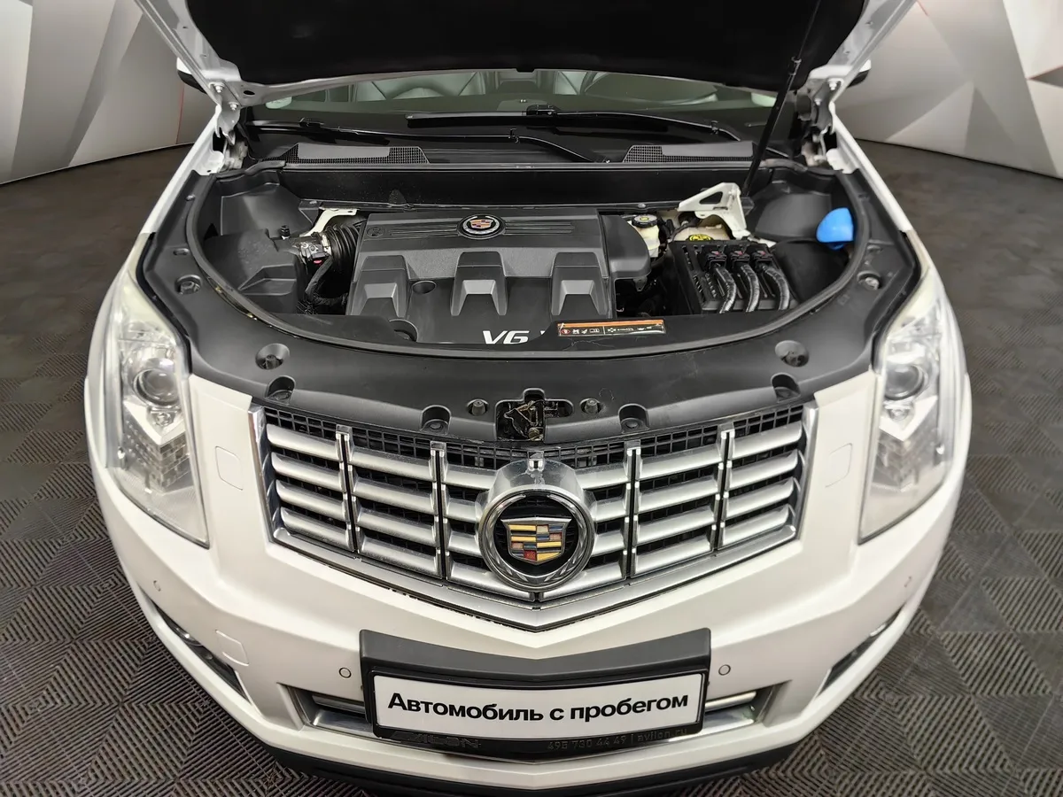 Cadillac SRX 3.0 AT (249 л.с.) Белый в АВИЛОН. Слайд №10