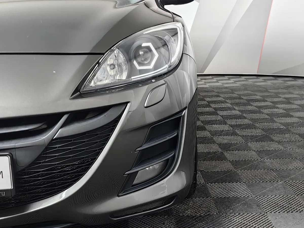 Mazda 3 1.6 AT (105 л.с.) Серый в АВИЛОН. Слайд №10