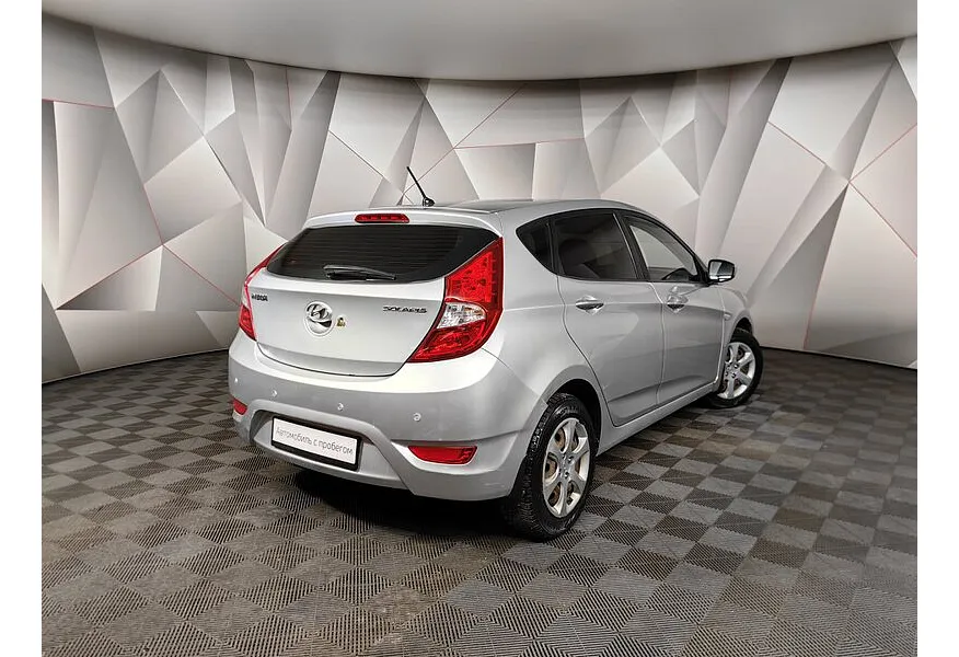 Hyundai Solaris 1.4 AT (107 л.с.) Style Серебристый в АВИЛОН. Слайд №2