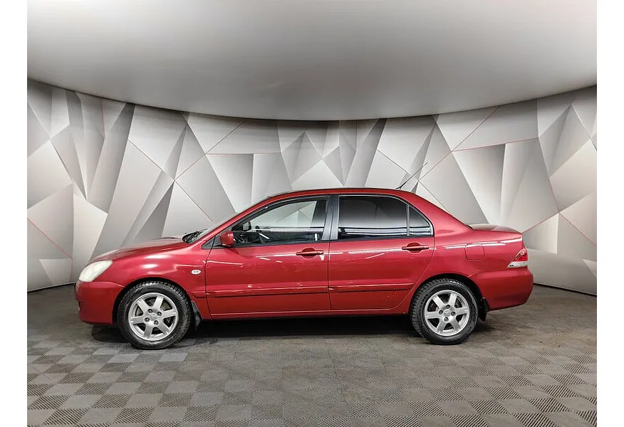 Mitsubishi Lancer 1.6 AT (98 л.с.) Красный в АВИЛОН. Слайд №5