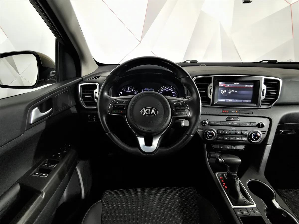 Kia Sportage 2.0 AT 4WD (150 л.с.) Luxe Коричневый в АВИЛОН. Слайд №19
